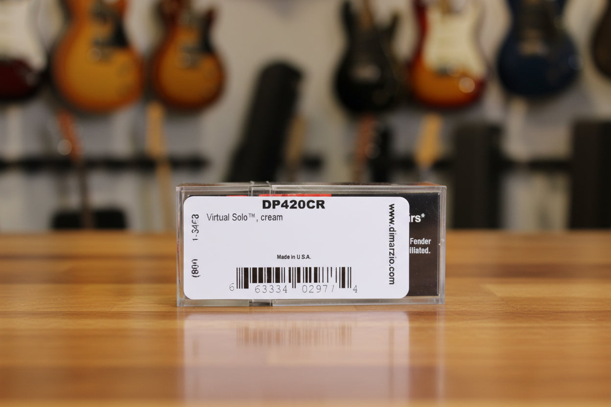 A close-up of a product label for a virtual guitar solo effect pedal, model DP420CR, cream color, inside a clear plastic case.
